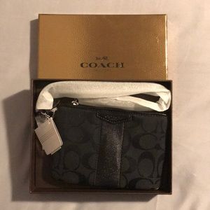 Brand new coach wristlet with tags and box